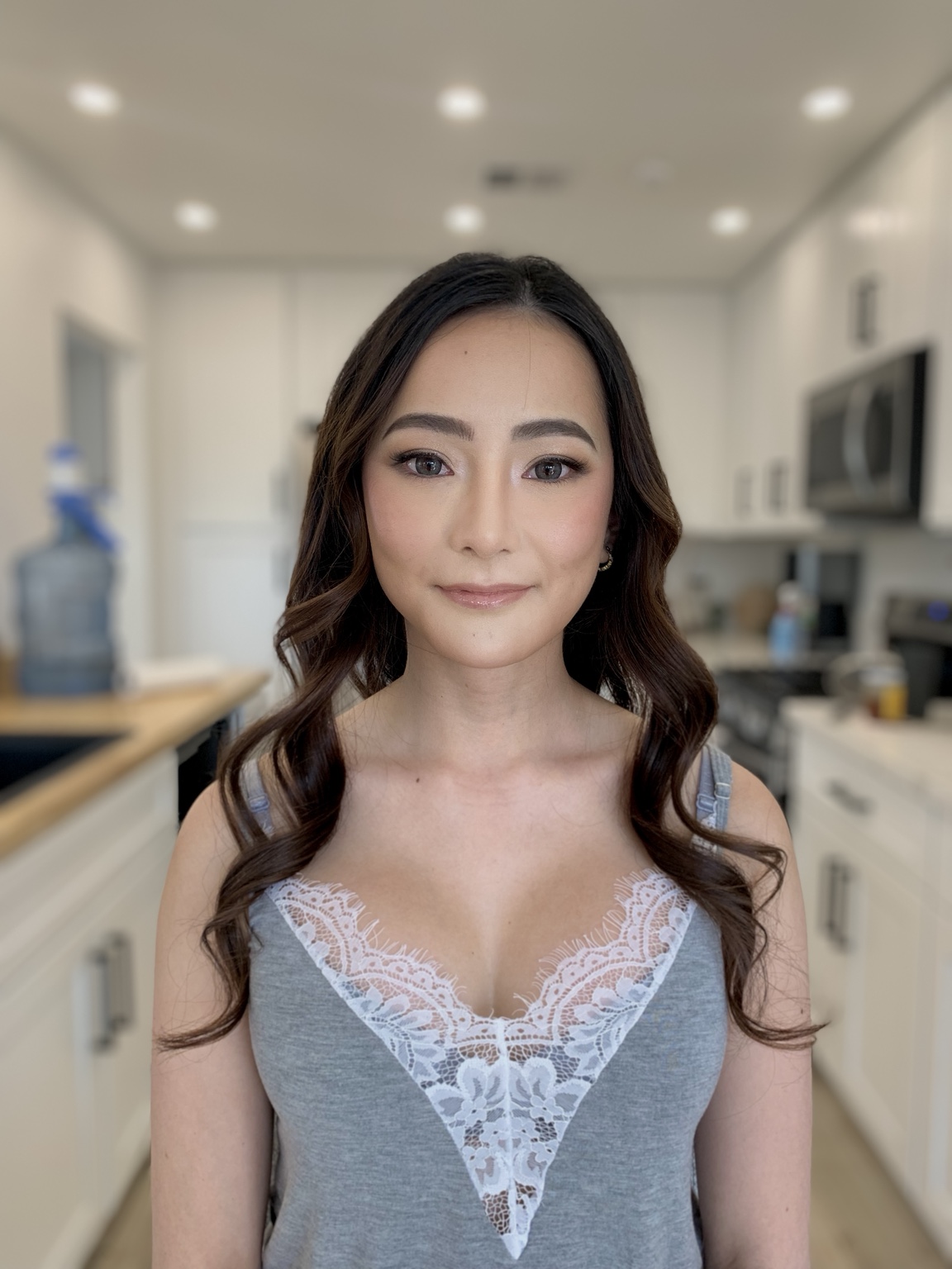 Finished hair and makeup on a client